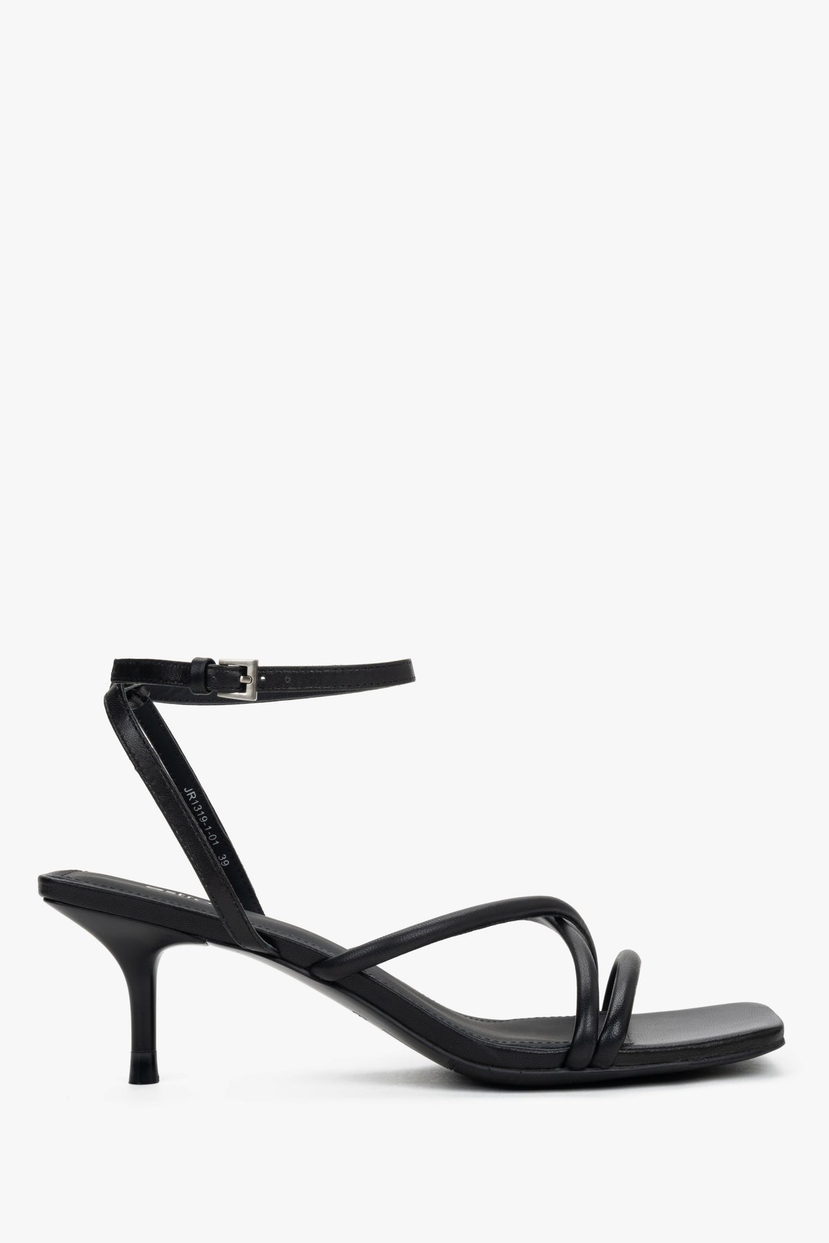 Women’s black leather stiletto sandals by Estro with thin crossing straps.