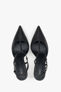 Estro black leather stiletto slingbacks for women.