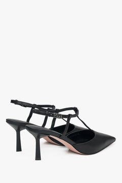 Sleek black slingbacks with pointed toe and stiletto heel.