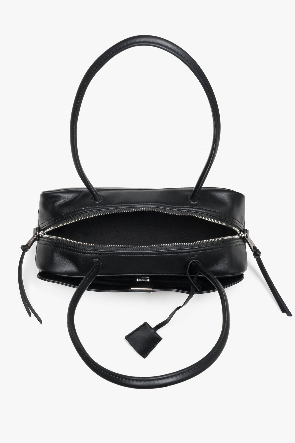 Black women’s shoulder bag in genuine leather with decorative zipper charms.