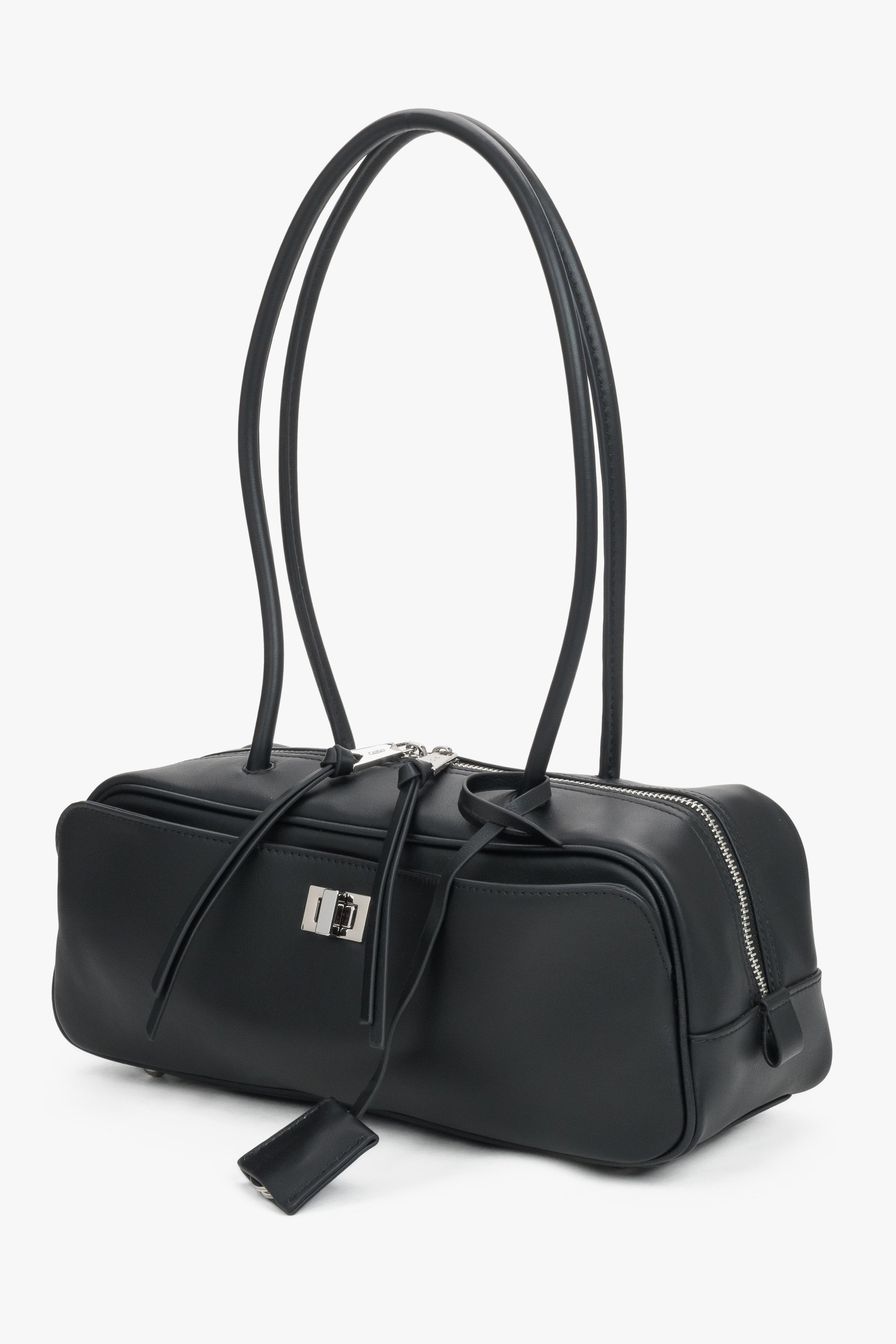 Elegant black leather bag with two compartments and long handles for comfortable wear.