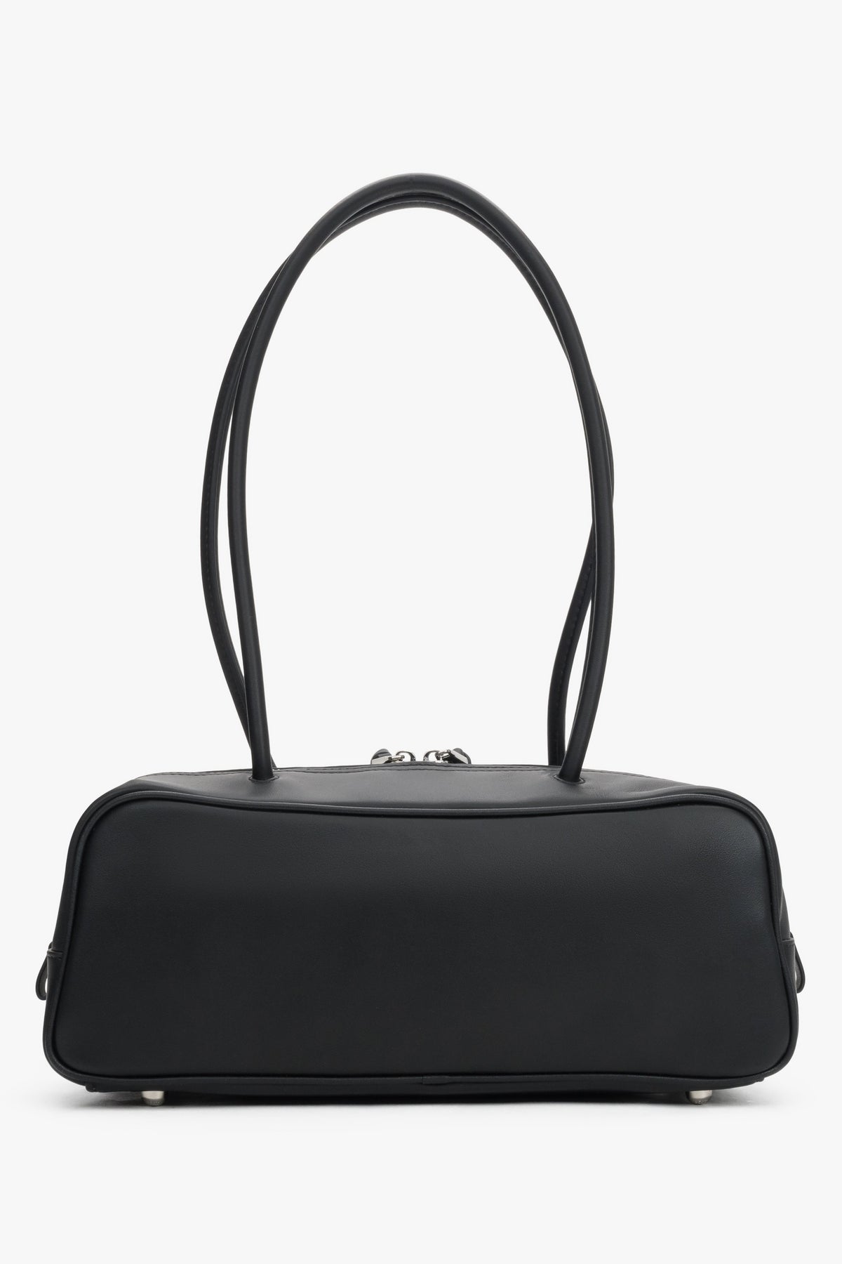 Compact structured shoulder bag in genuine leather with textile lining and tassel details.