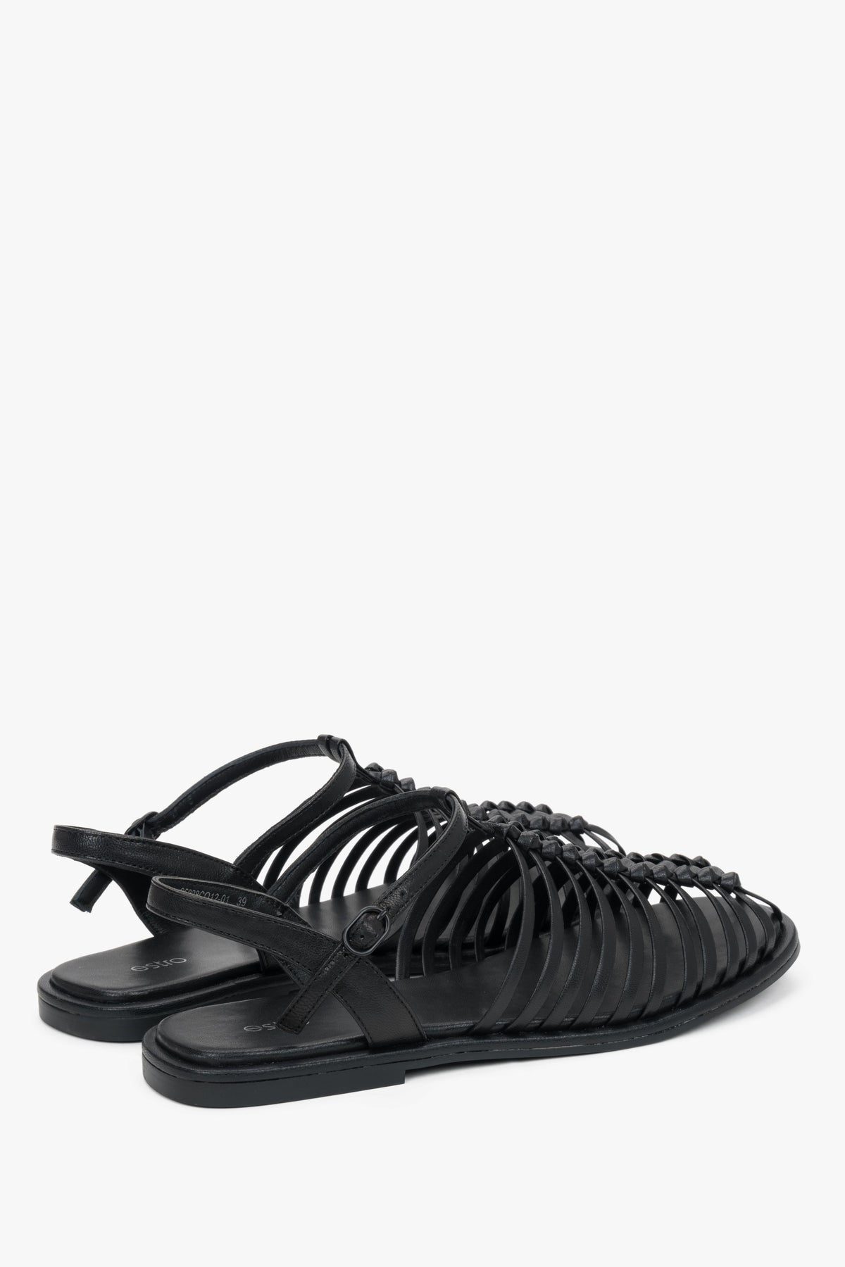 Estro black leather cage sandals with a premium chevro insole.