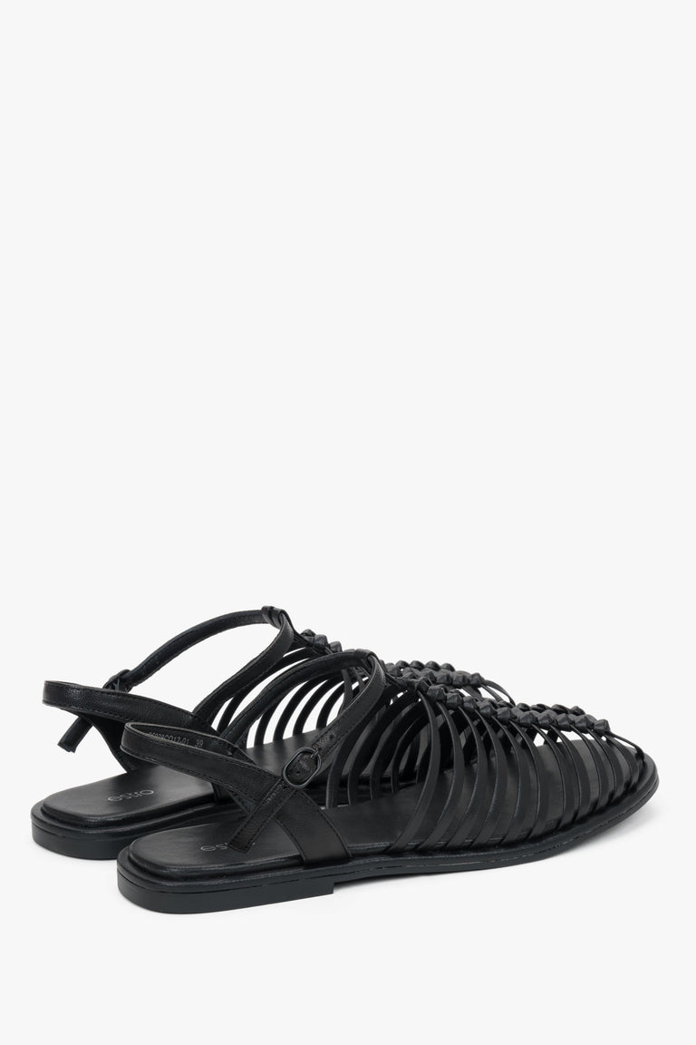 Estro black leather cage sandals with a premium chevro insole.