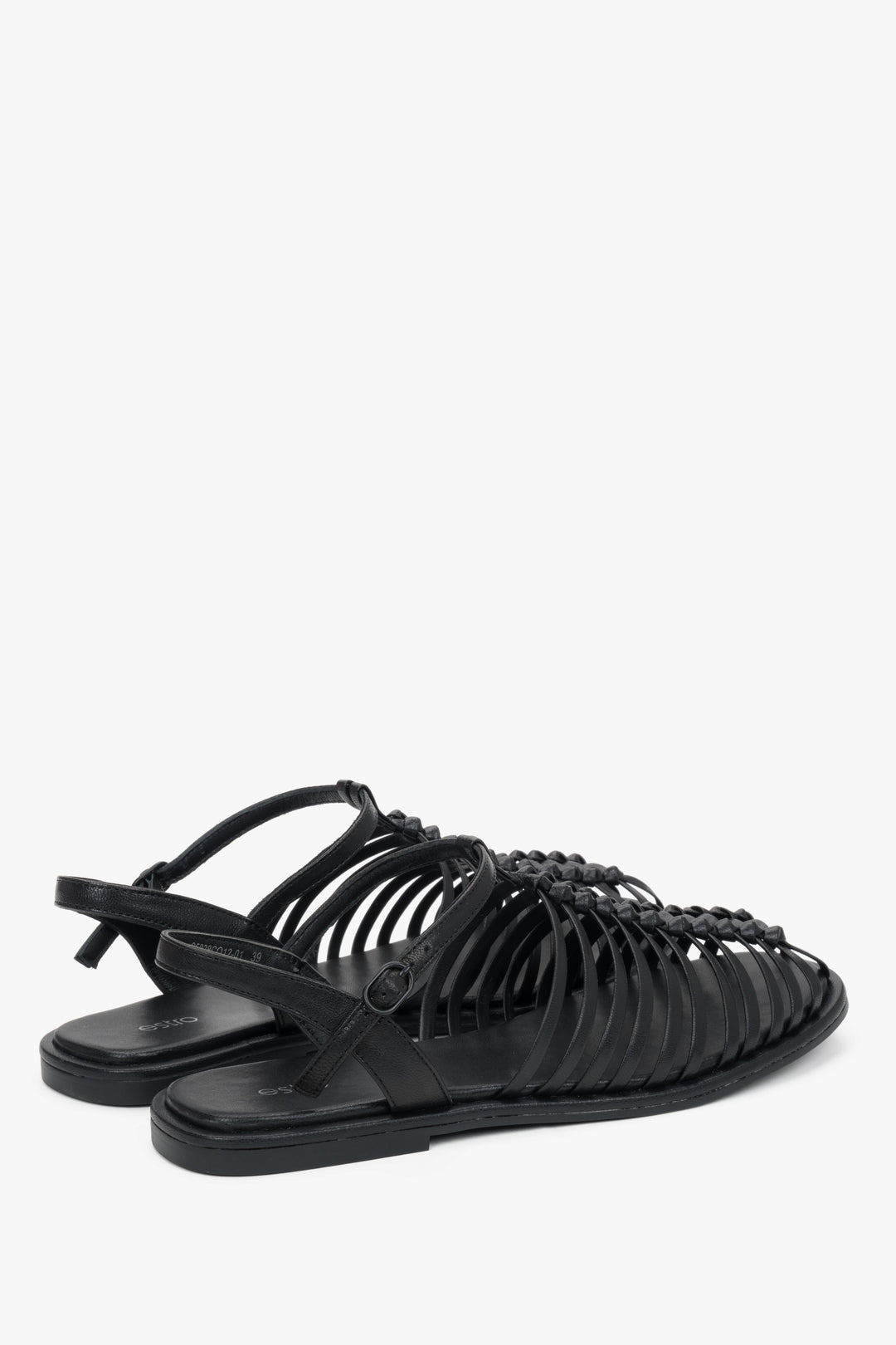 Estro black leather cage sandals with a premium chevro insole.