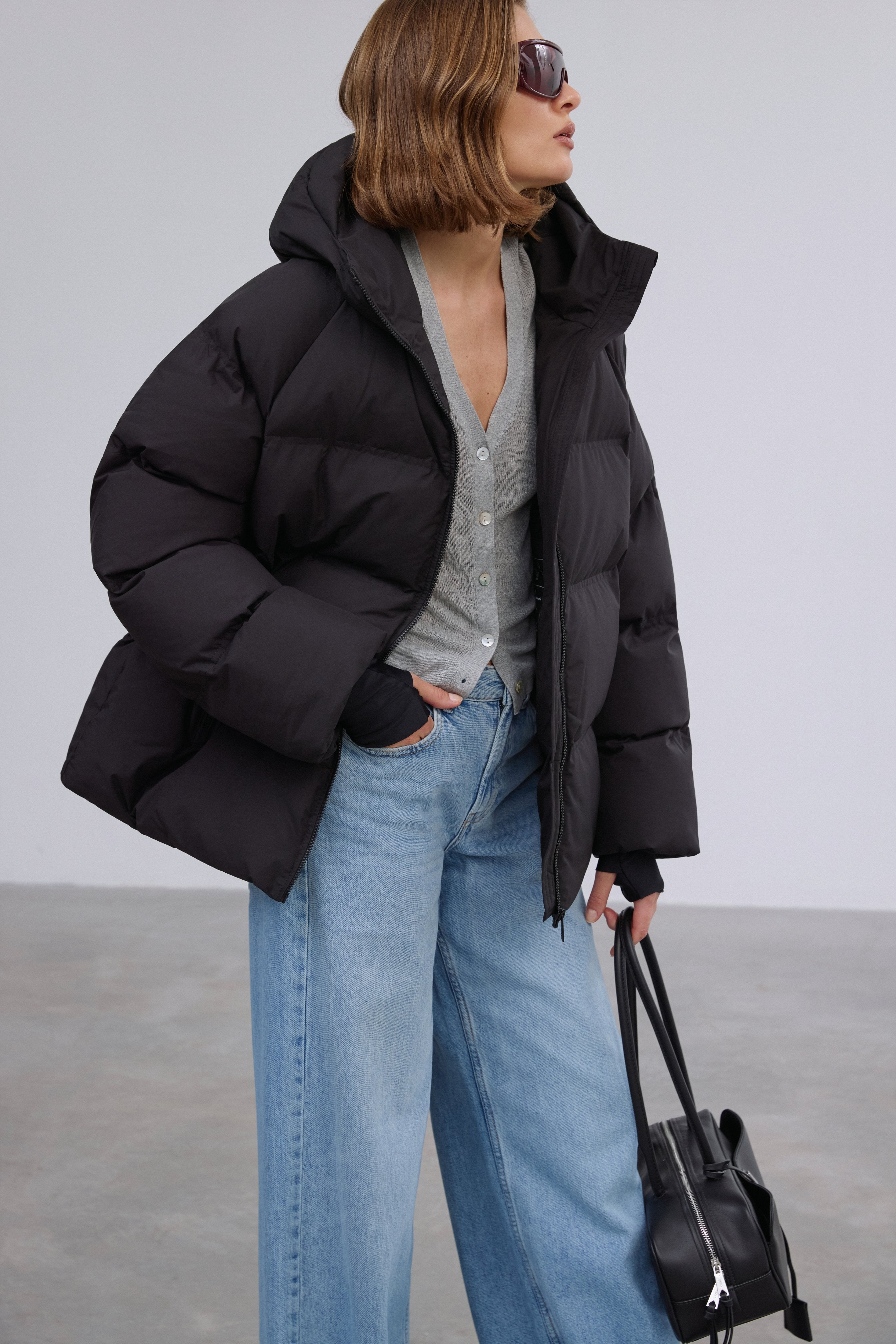 Side profile highlighting the modern loose fit and cozy eco-down filling.
