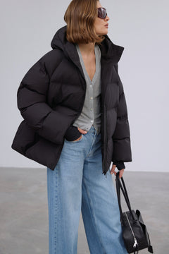 Side profile highlighting the modern loose fit and cozy eco-down filling.