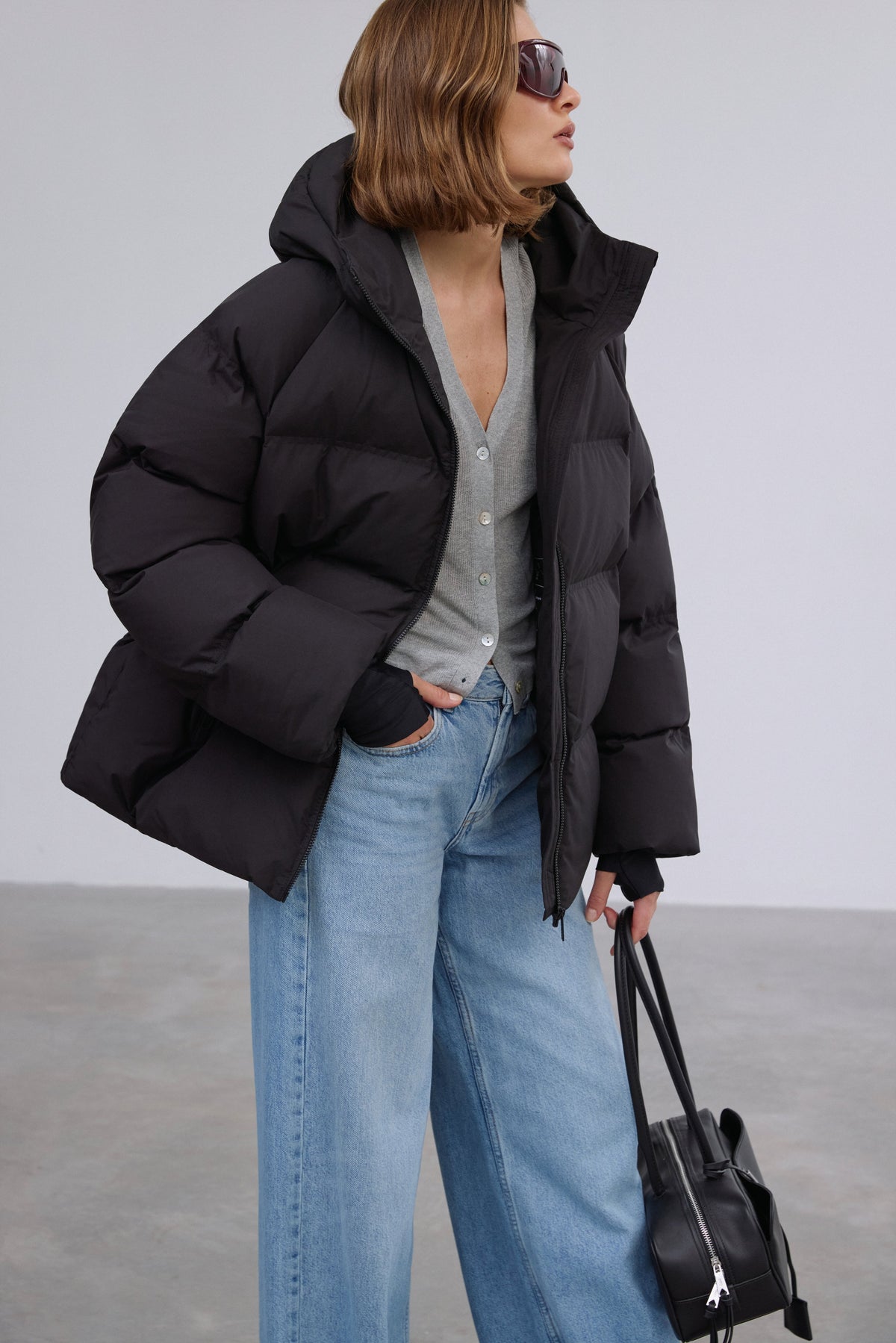 Side profile highlighting the modern loose fit and cozy eco-down filling.