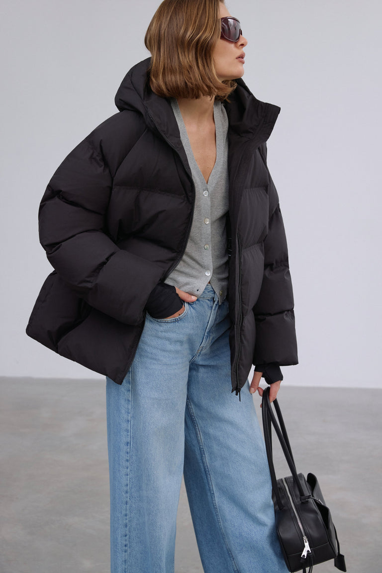 Side profile highlighting the modern loose fit and cozy eco-down filling.