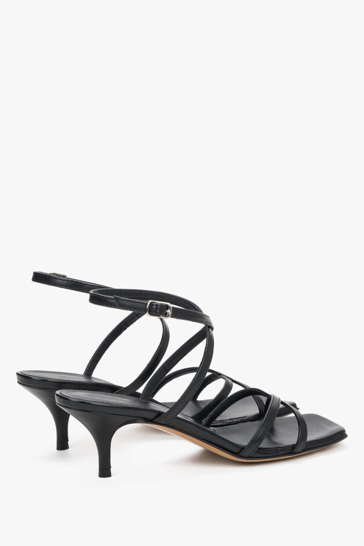 Sophisticated black leather sandals for women, perfect for quiet luxury and evening wear.