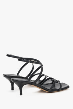 Sophisticated black leather sandals for women, perfect for quiet luxury and evening wear.
