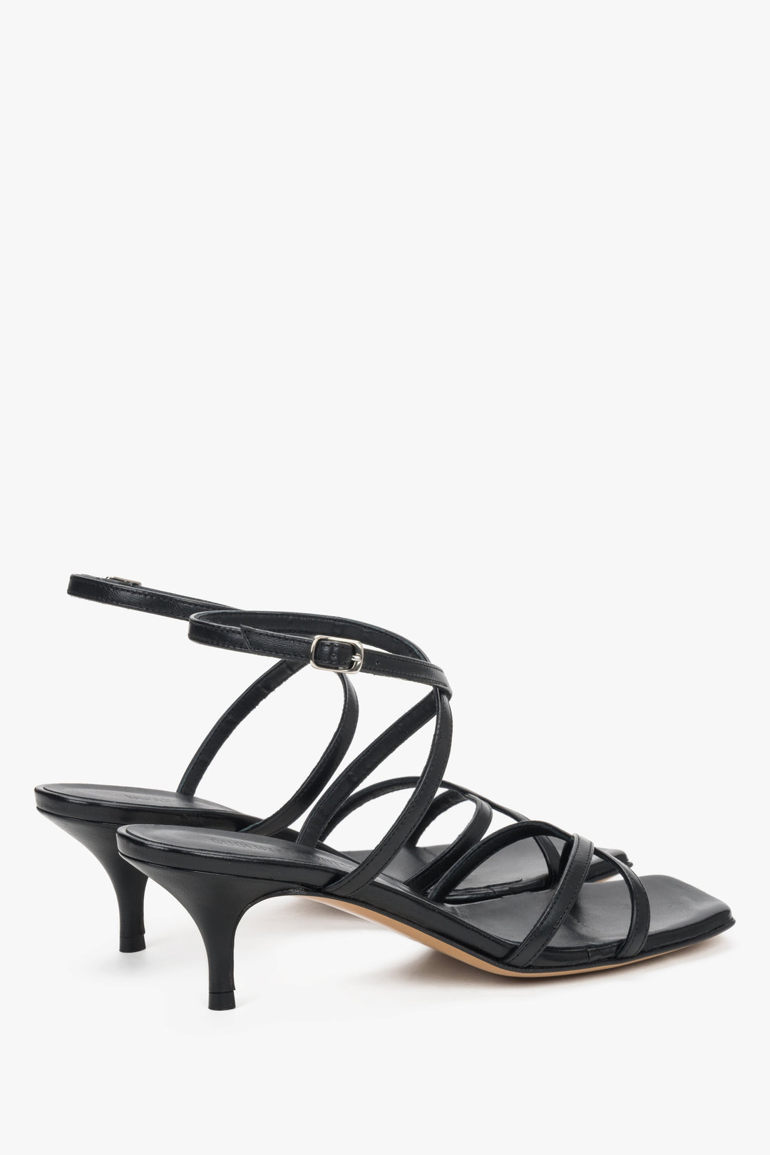 Sophisticated black leather sandals for women, perfect for quiet luxury and evening wear.