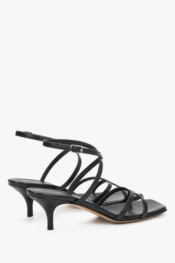 Sophisticated black leather sandals for women, perfect for quiet luxury and evening wear.