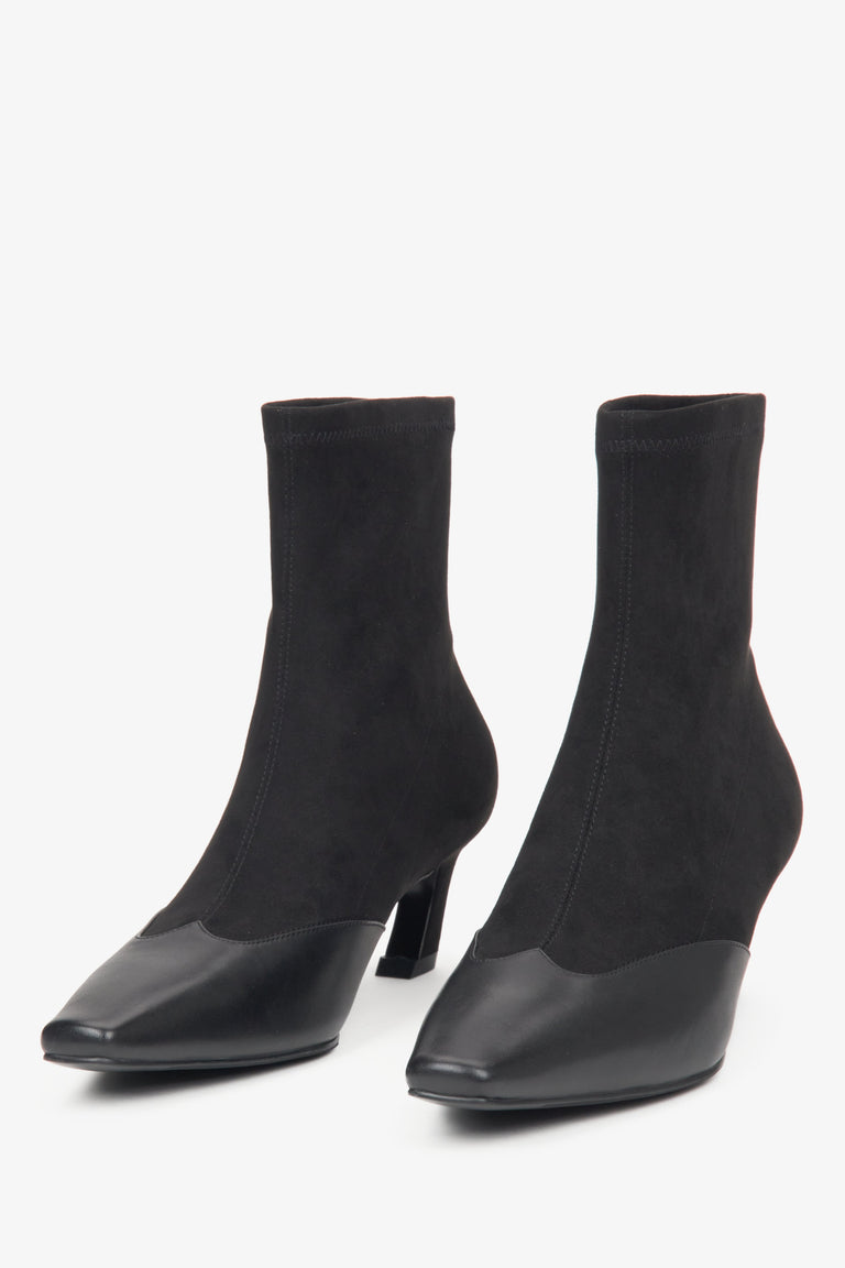 Black low-heeled ankle boots for women, made of soft textiles and leather, designed by Estro.