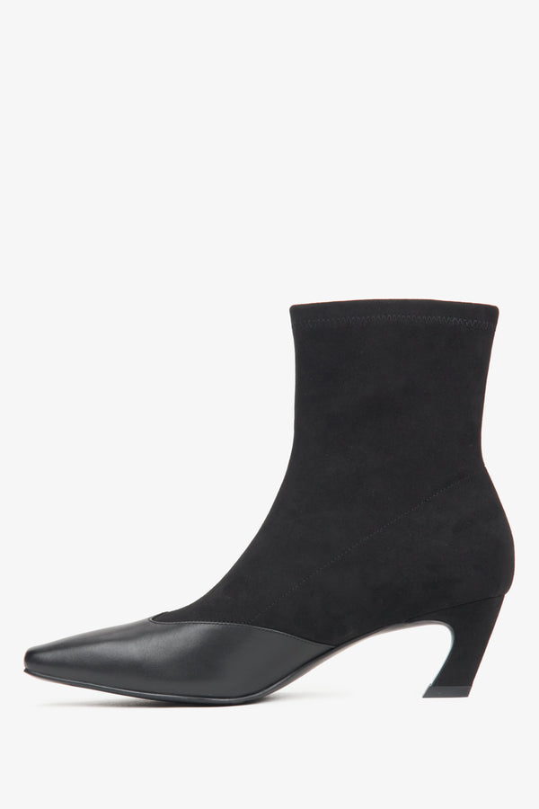 Estro's women's black ankle boots in a mix of soft textiles and leather with a low heel.