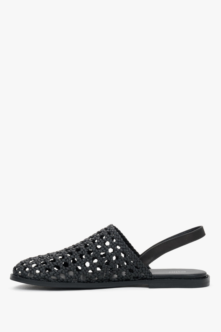 Elegant black leather slip-on sandals with a woven closed-toe design.
