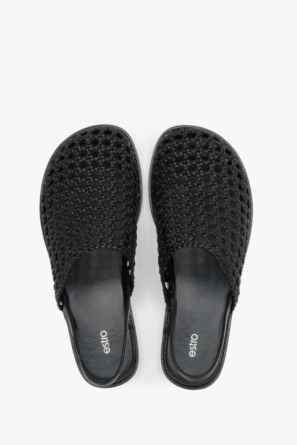 Women's flat leather sandals with a breathable openwork weave.