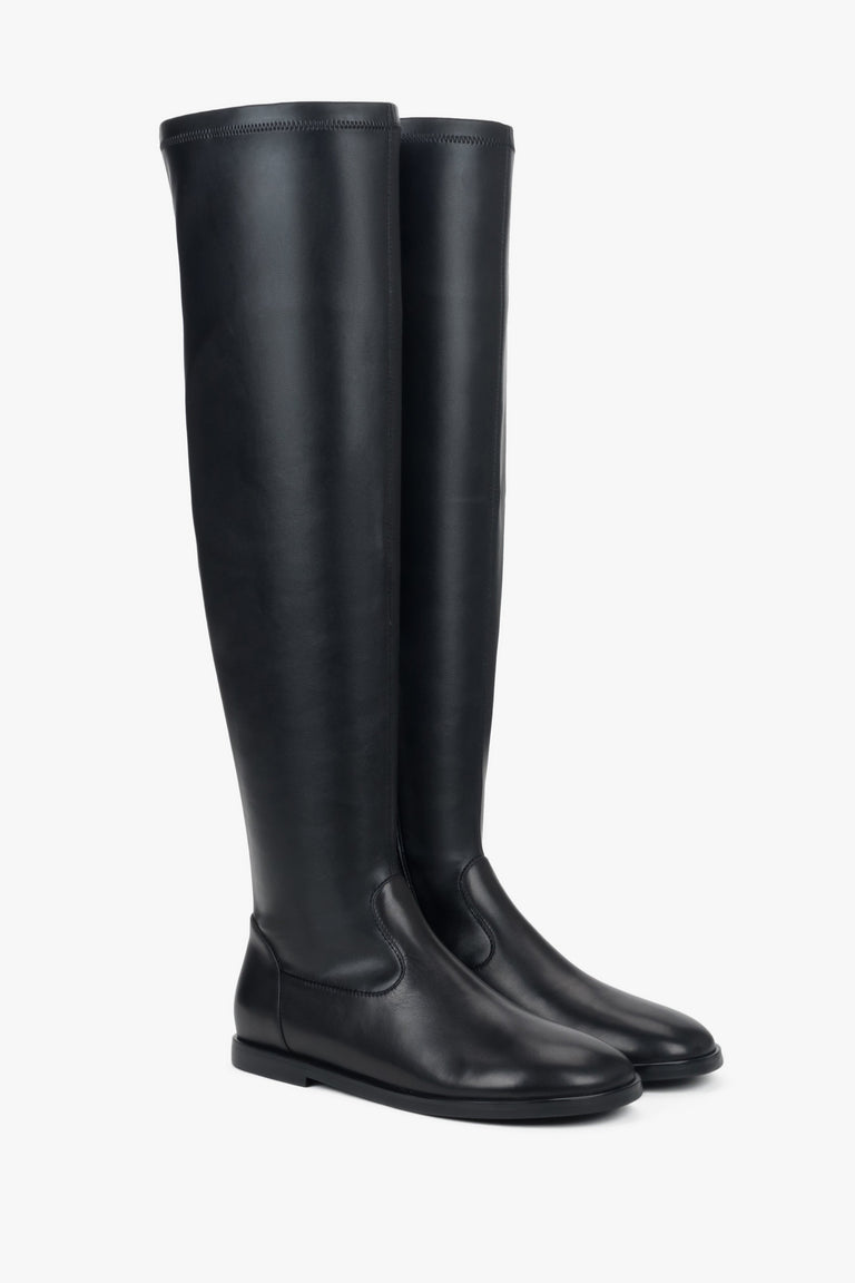 Black women’s over-the-knee boots made of natural leather and stretch.