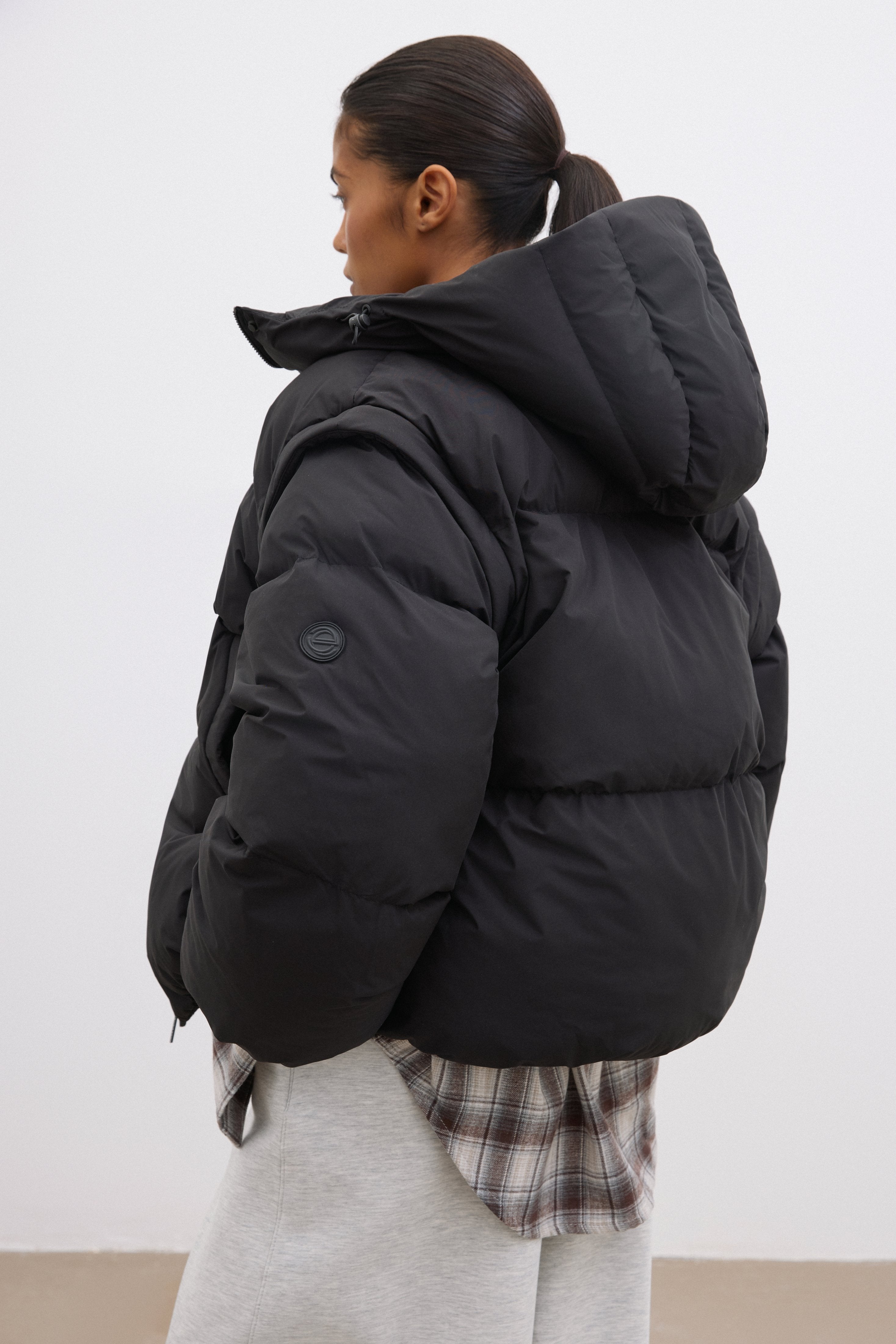 Black Women's Oversized Jacket with Detachable Sleeves.