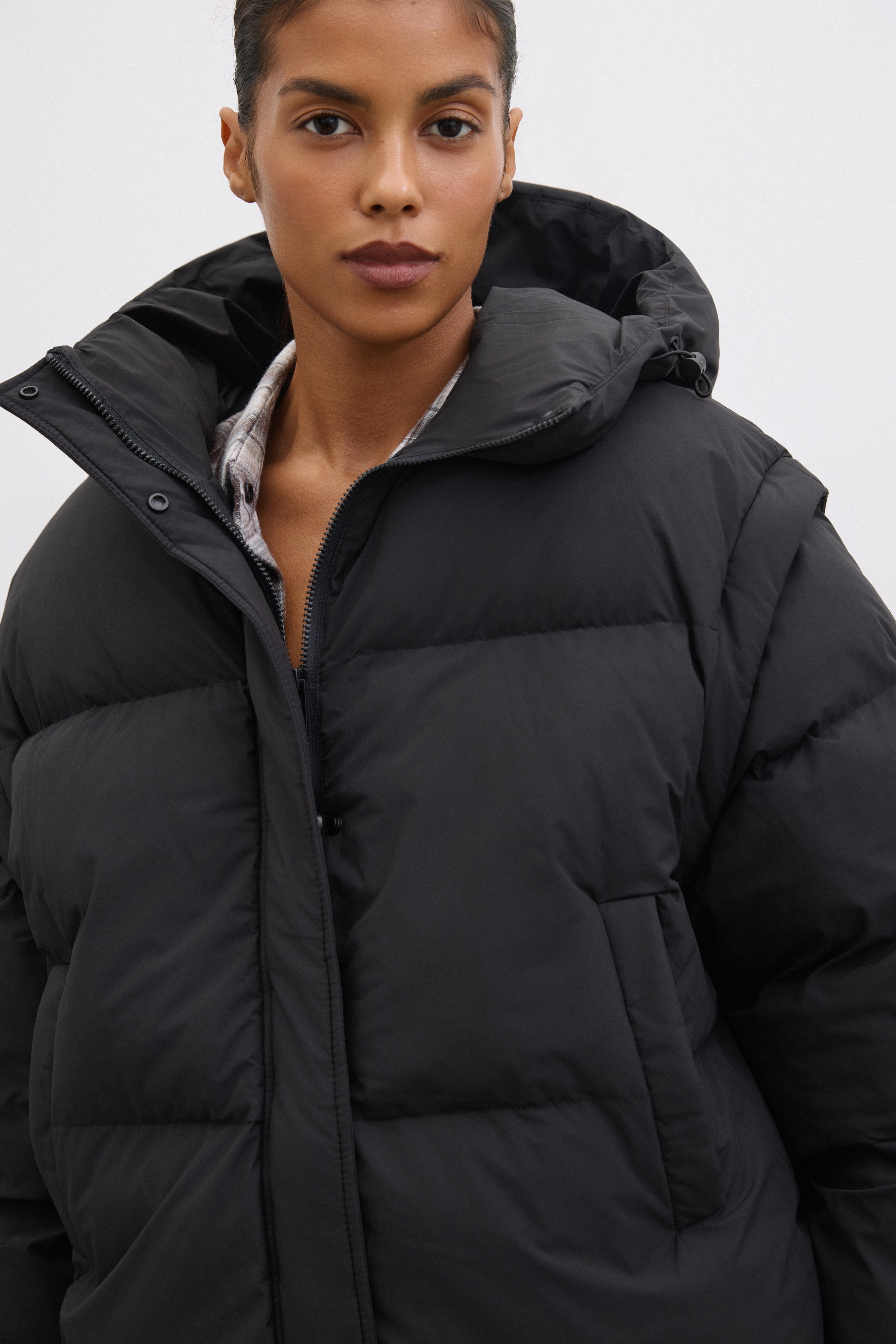 Black Women's Jacket in an Oversized Cut with Detachable Sleeves.