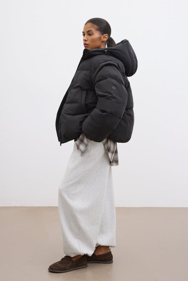 2-in-1 Black Jacket and Vest with Detachable Sleeves, Oversized Fit.