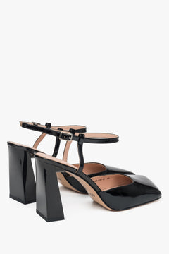 Women’s black block heel sandals in patent leather by Estro – back view.