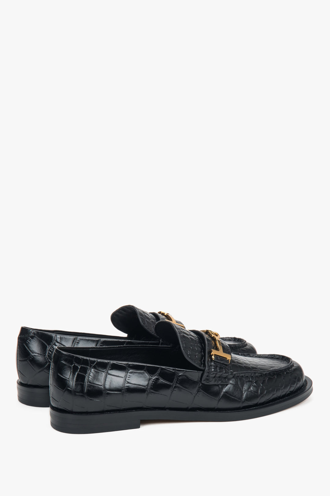 Black women’s patent leather loafers with a decorative buckle Estro.