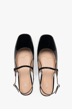 Estro women's slingback flats in black patent leather.