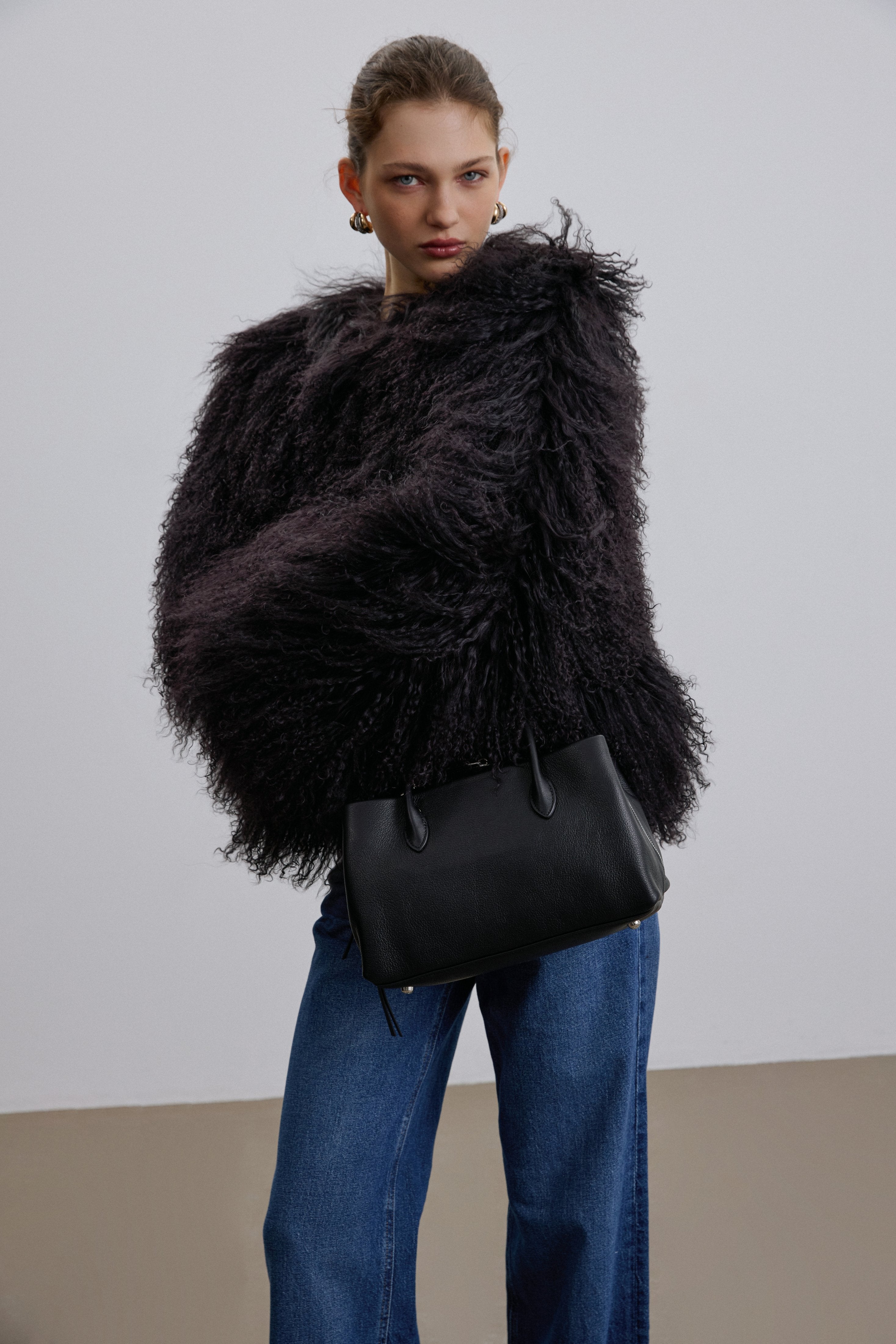 Estro – black genuine pebbled leather handbag.