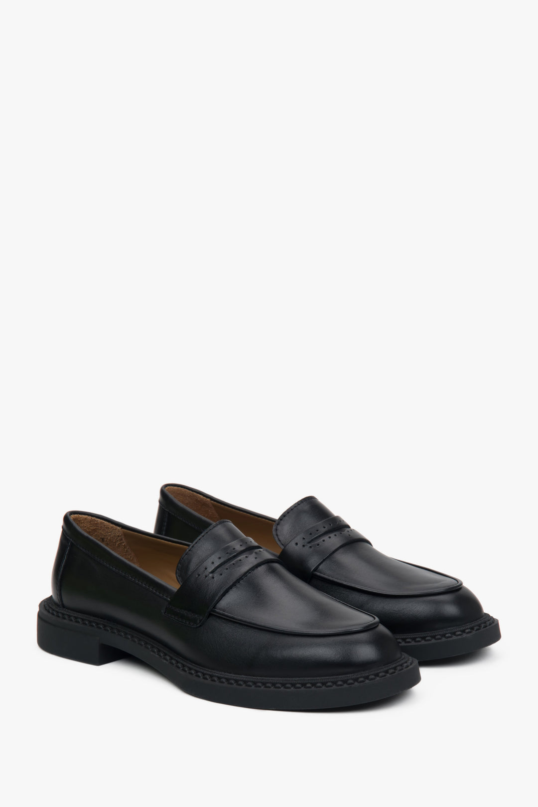 Classic black penny loafers crafted from premium Italian leather by Estro.