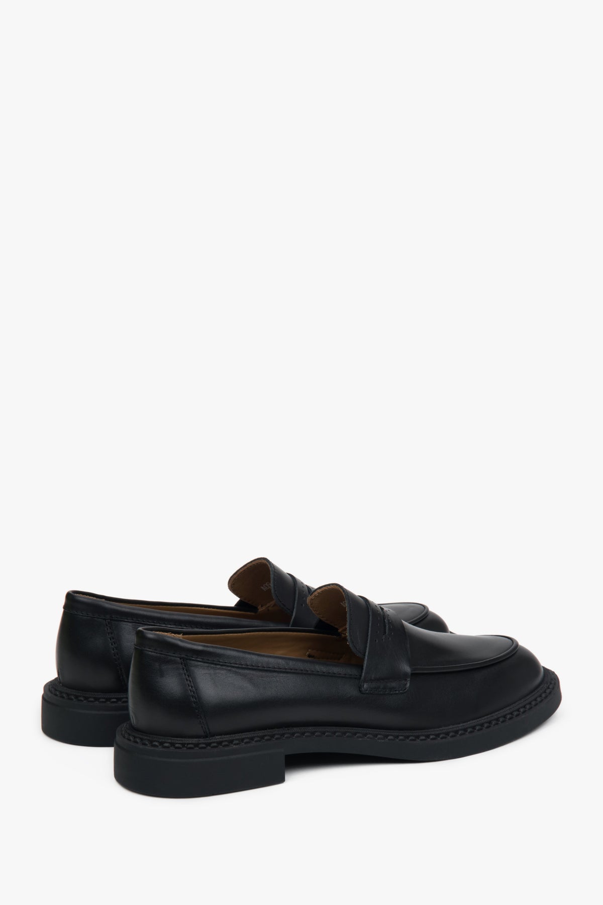Women's penny loafers made from Italian leather in black.