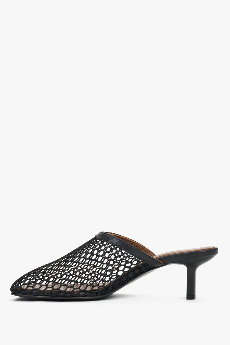 Women’s black openwork mule-style slip-on sandals by Estro on a stable stiletto heel – side view.