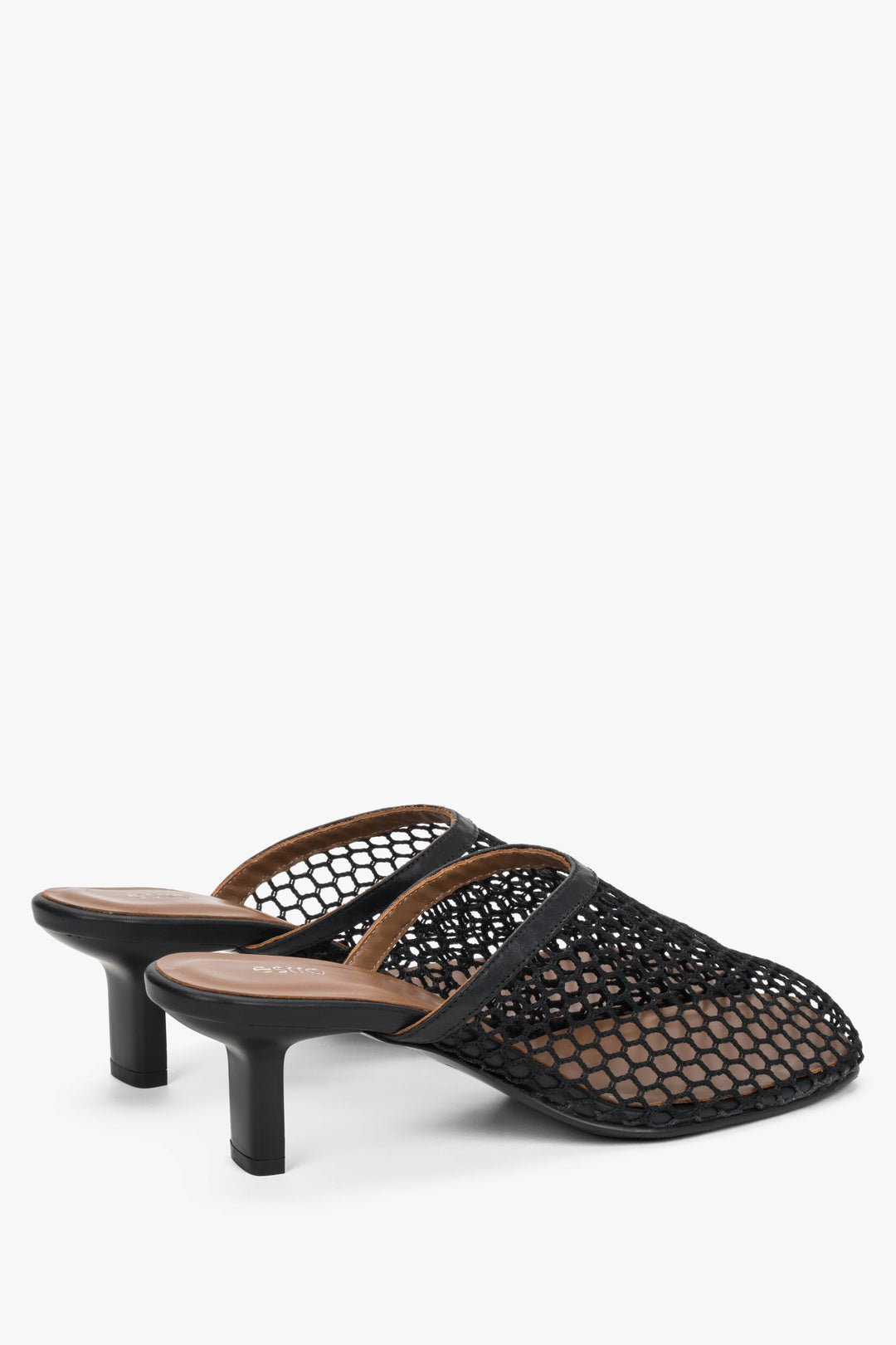 Women’s black openwork mule-style slip-on sandals by Estro on a stable stiletto heel – heel view.