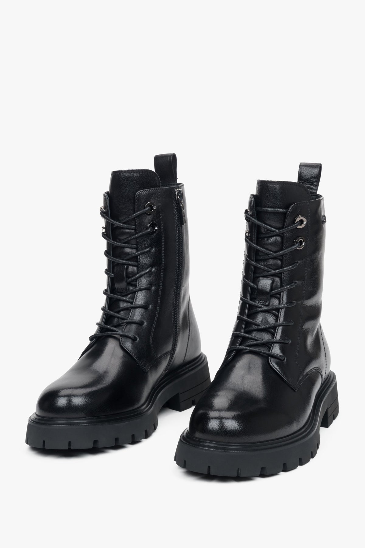 Women's black ankle boots on a platform made of genuine leather Estro.