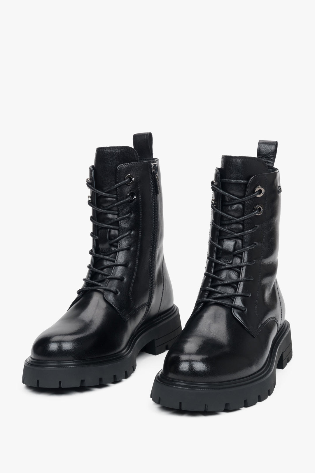 Women's black ankle boots on a platform made of genuine leather Estro.