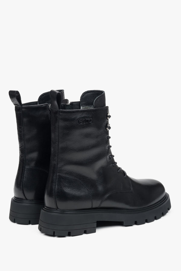 Platform-style women's black ankle boots made of genuine leather Estro.