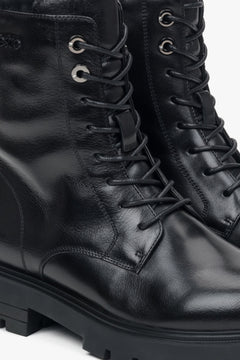 Platform-style women's black ankle boots made of genuine leather Estro.