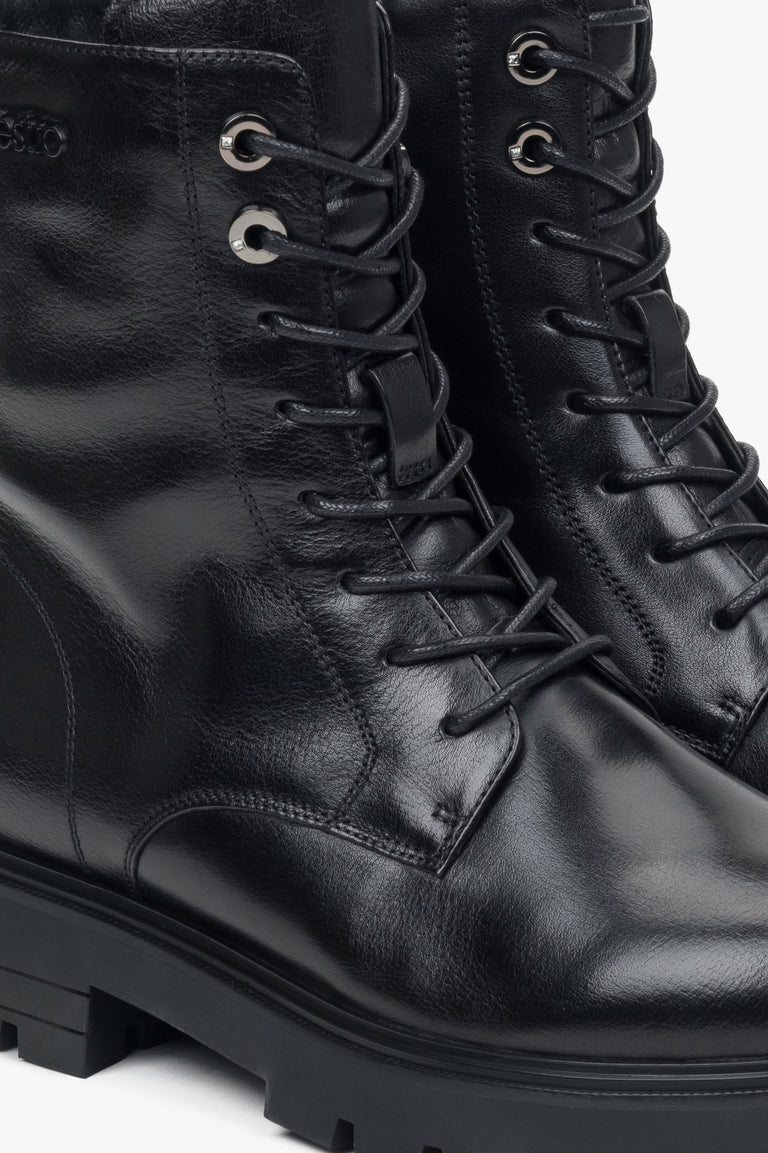 Platform-style women's black ankle boots made of genuine leather Estro.