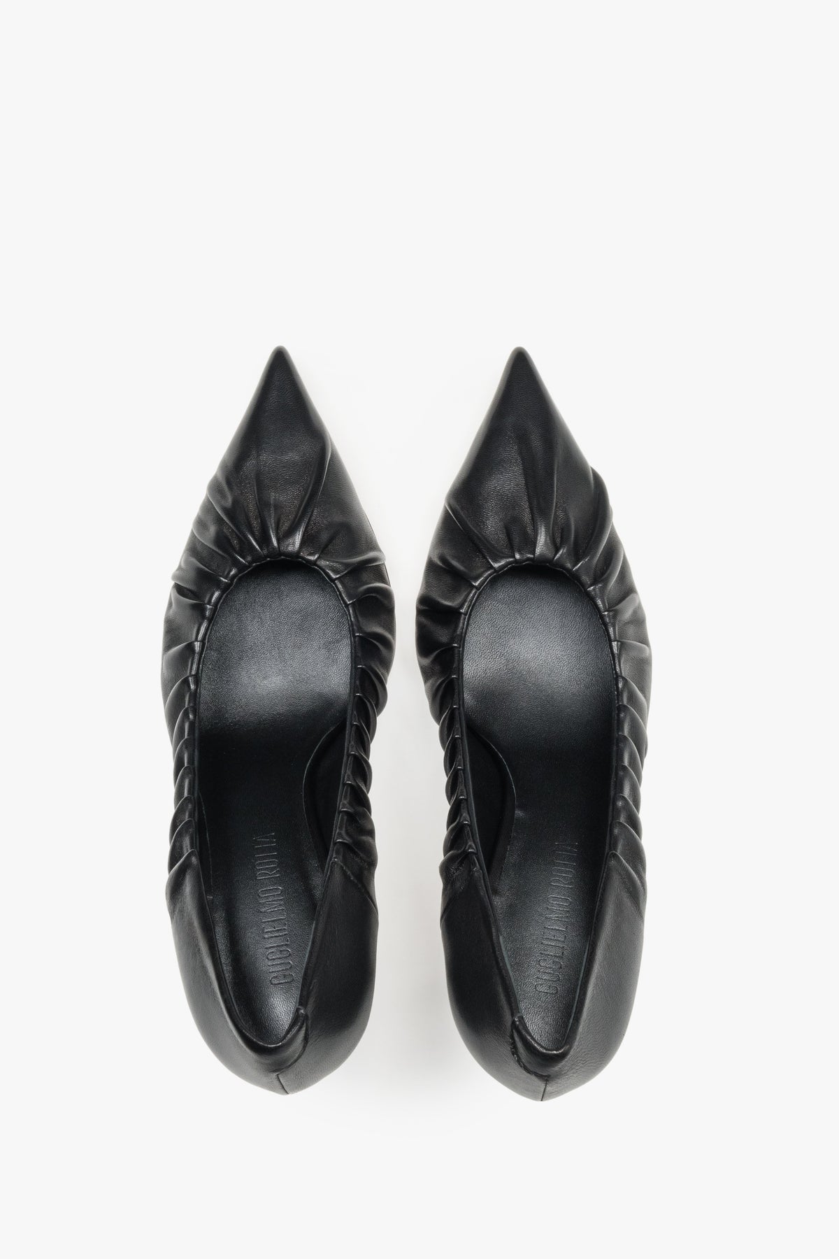 Luxury handcrafted Italian heels featuring a gathered upper detail and leather interior.