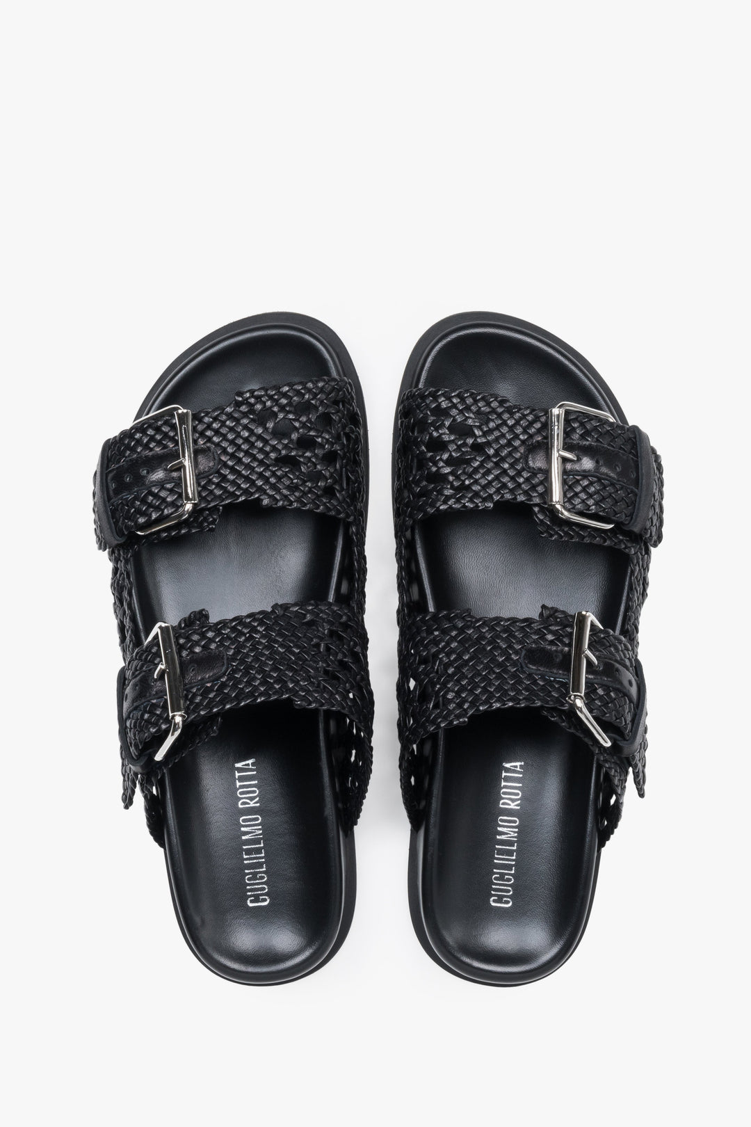Close-up of the perforated texture and premium finish on Guglielmo Rotta black leather slides.