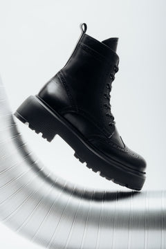 Women's black premium Italian genuine leather ankle boots with folk perforations Estro.