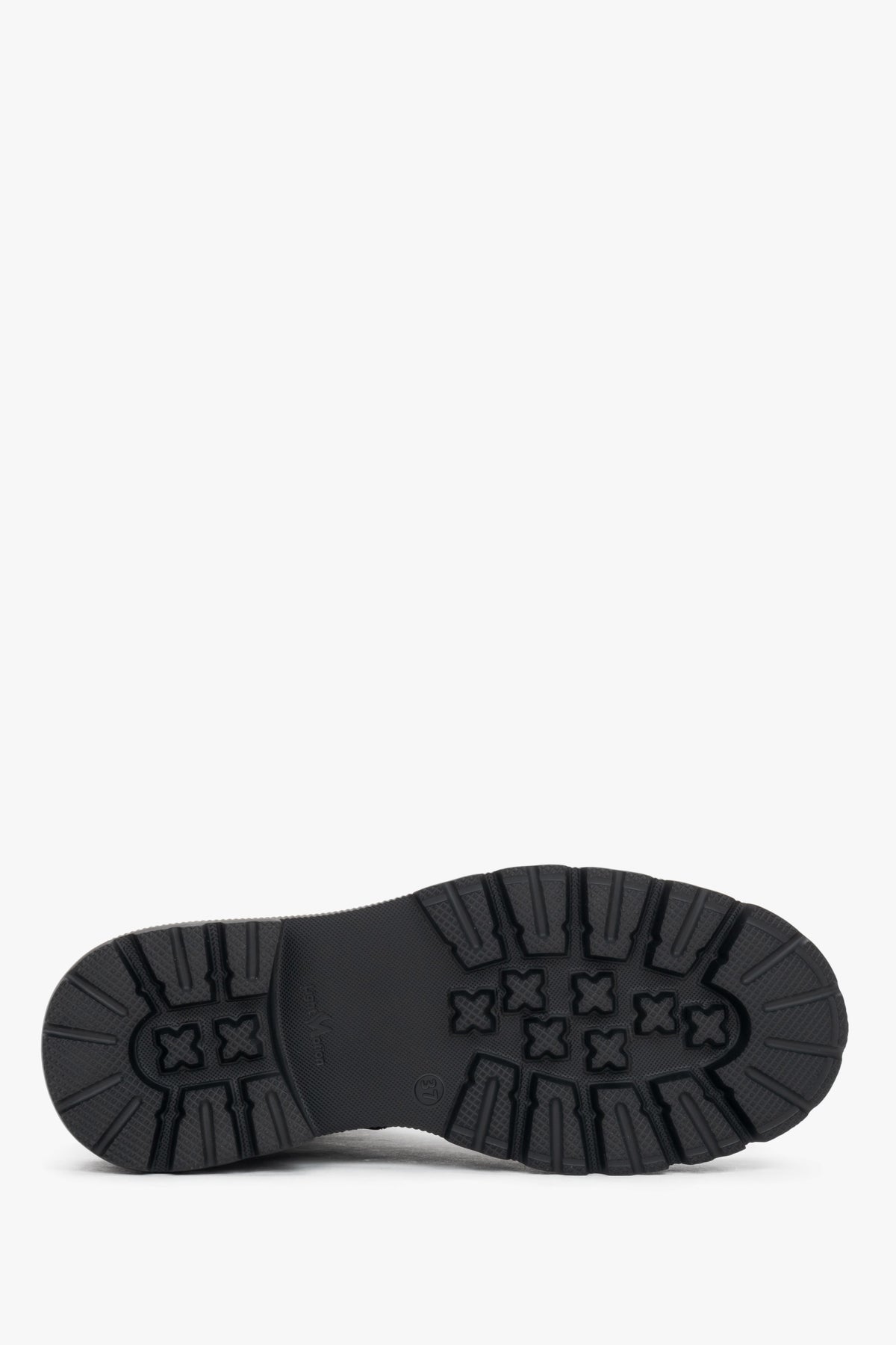 Black natural leather ankle boots featuring folk-style laser perforation details, Estro.