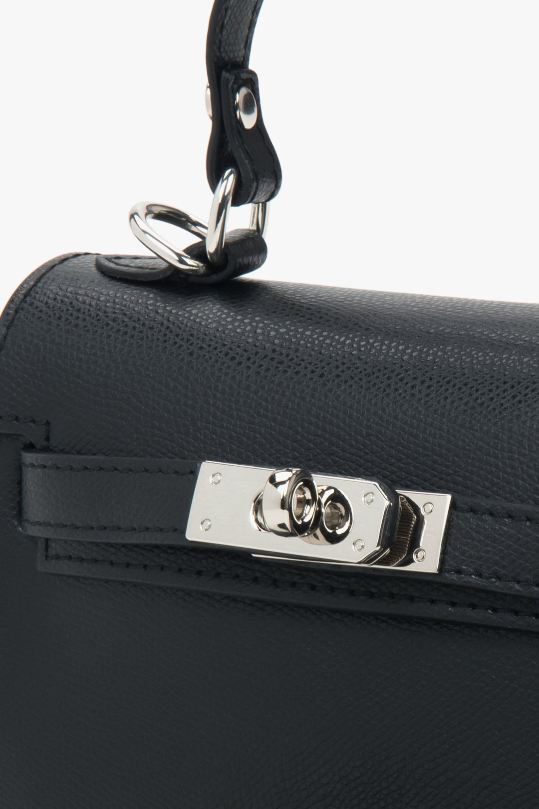Black leather satchel bag by Estro with silver accents.