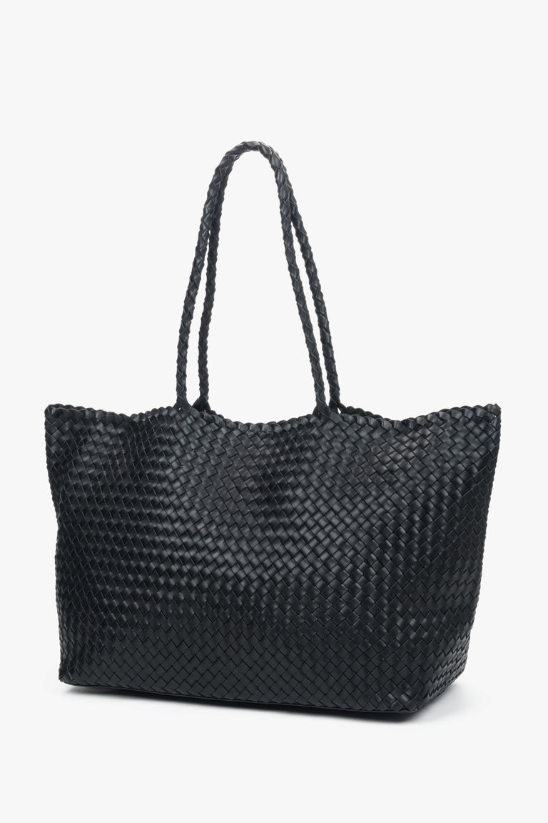 Black shopper bag crafted from genuine leather with velour and textile details, Estro.