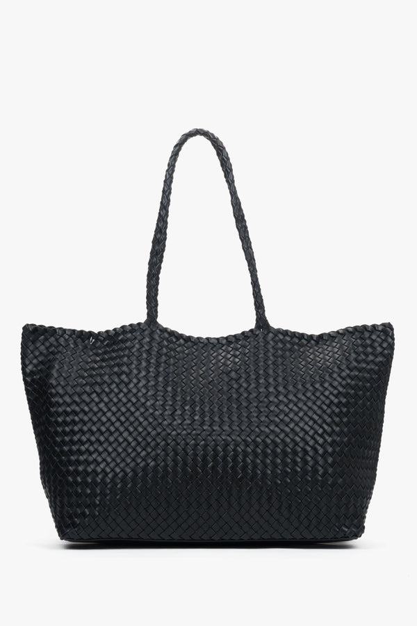 Women’s black shopper bag in woven genuine leather with velour and textile interior.