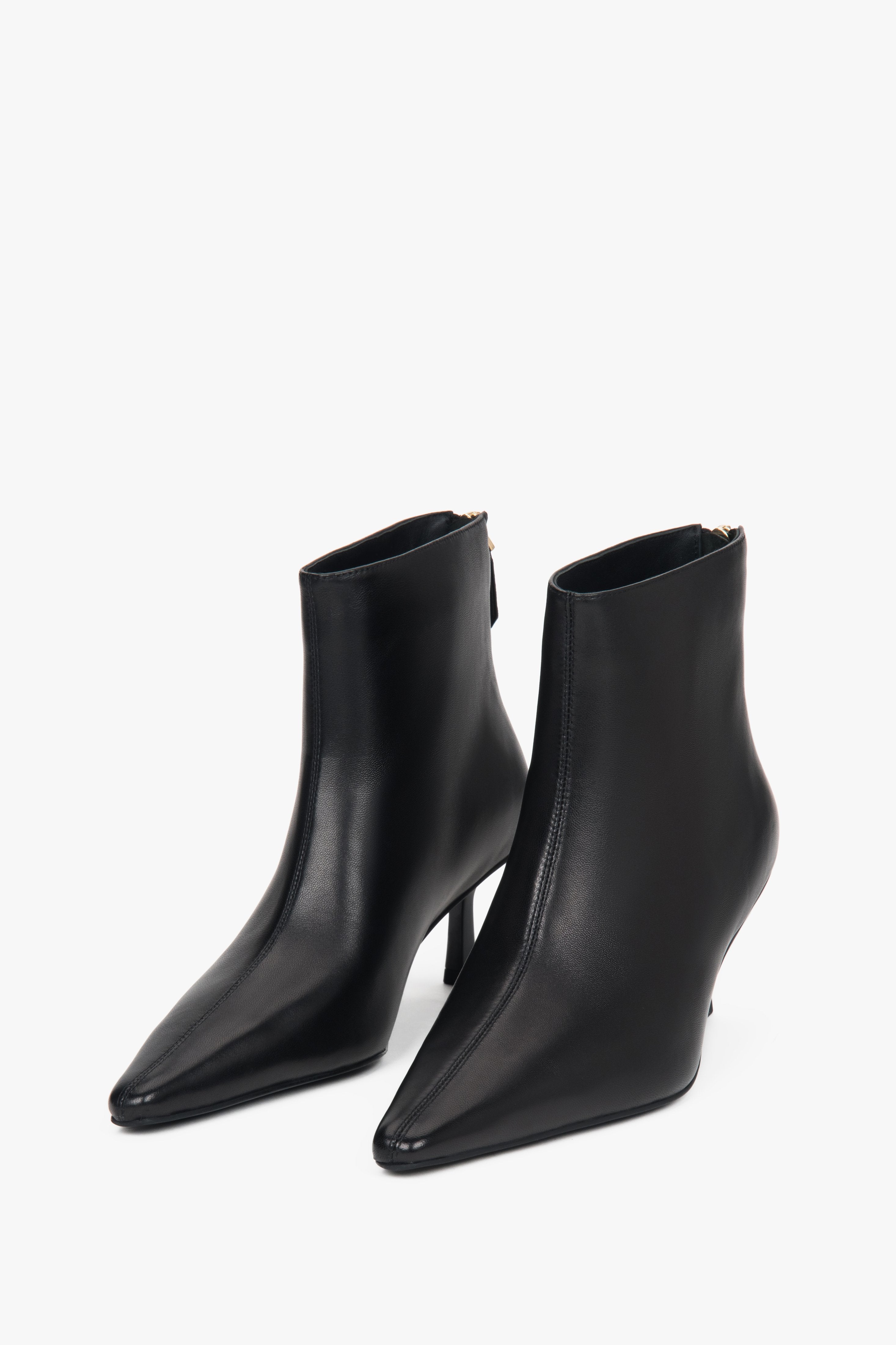 Women’s black, short ankle boots made of genuine leather with a low heel Estro.
