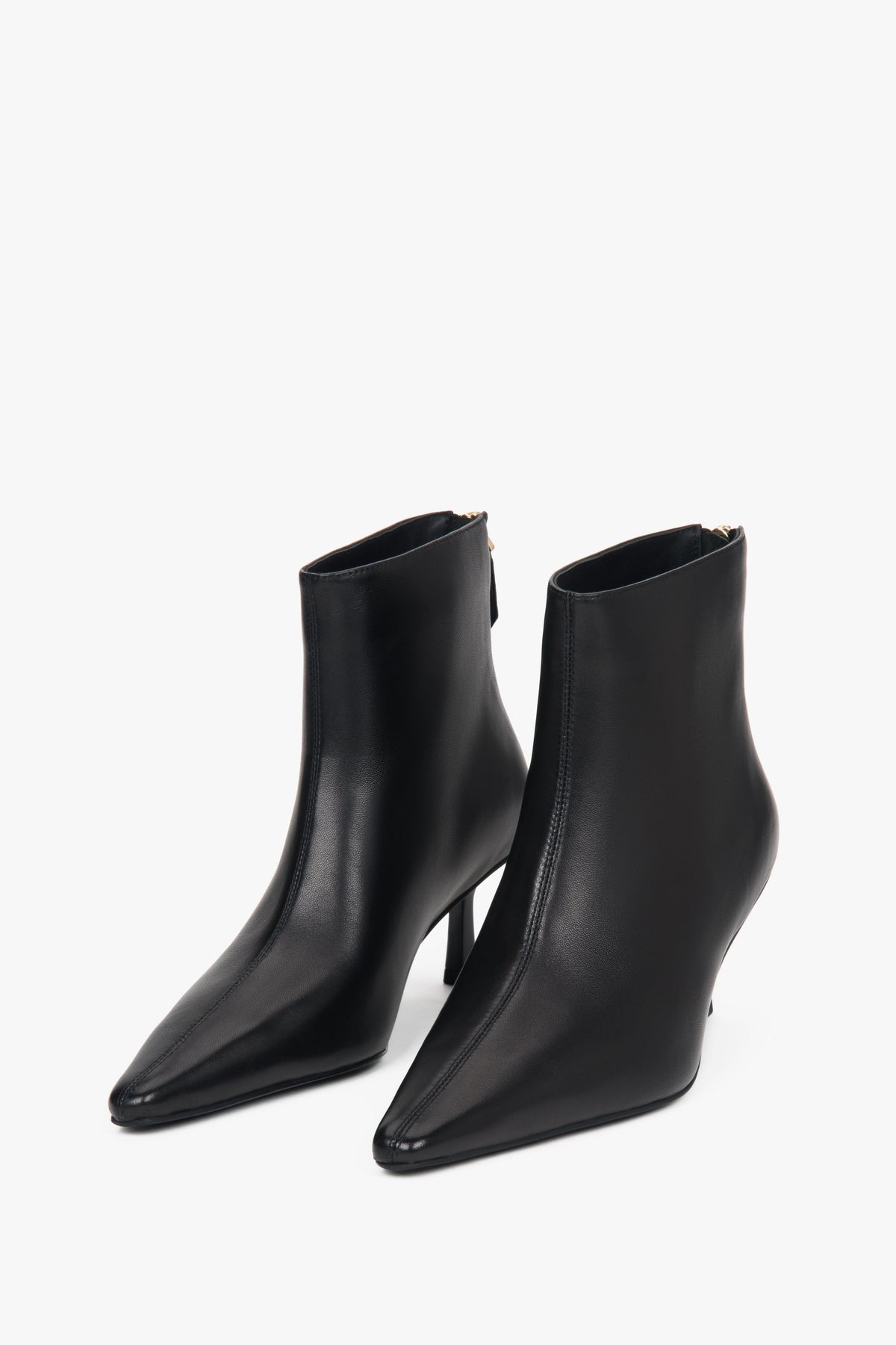 Women’s black, short ankle boots made of genuine leather with a low heel Estro.
