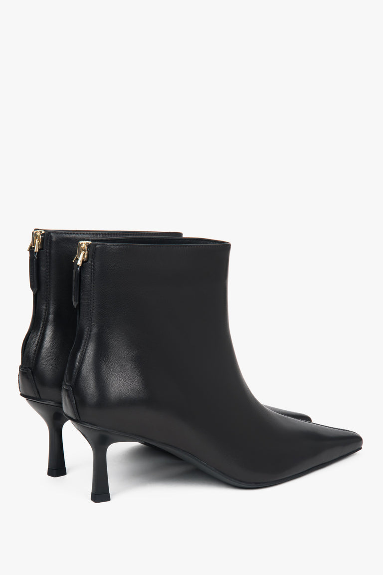 With a low heel, black, short women’s ankle boots made of genuine leather Estro.