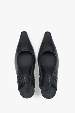 Black women’s peep-back pumps Estro Selection.
