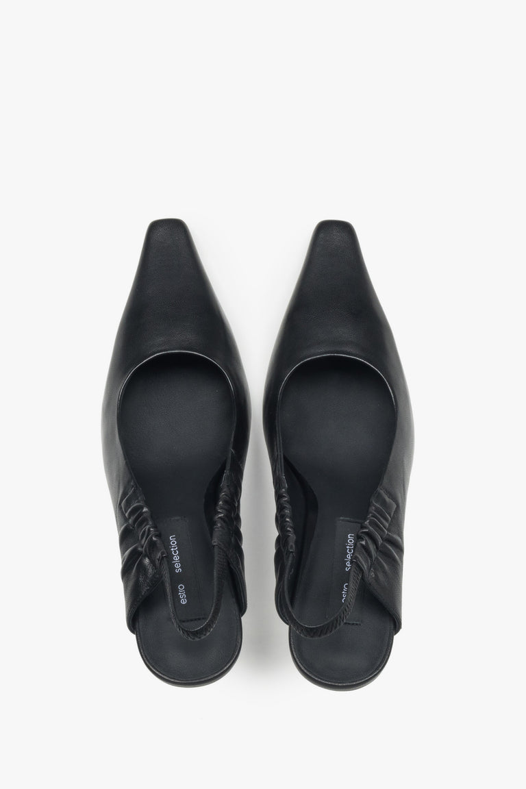 Black women’s peep-back pumps Estro Selection.